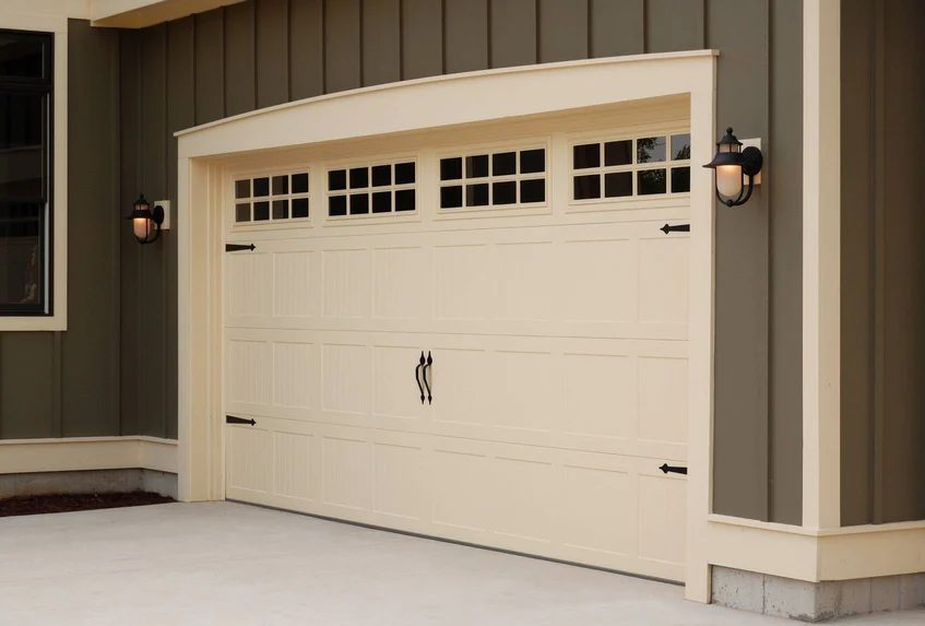 Stamped carriage house garage door
