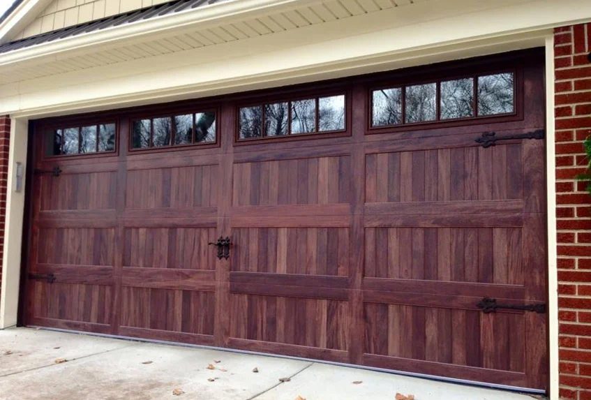 Stamped carriage house garage door
