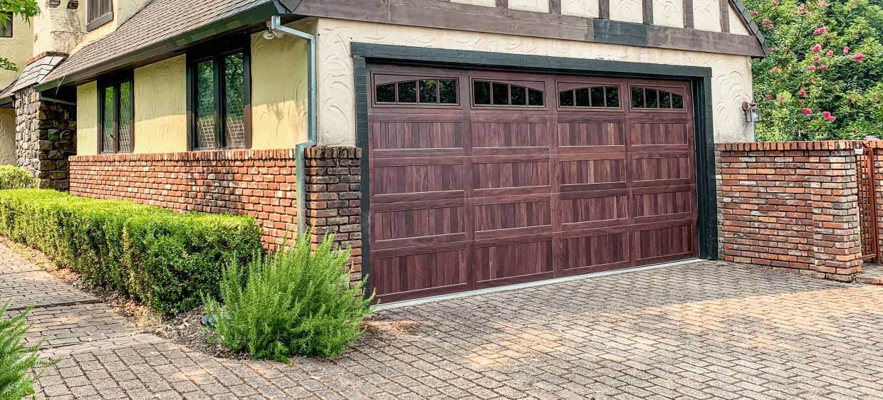 Stamped carriage house garage door