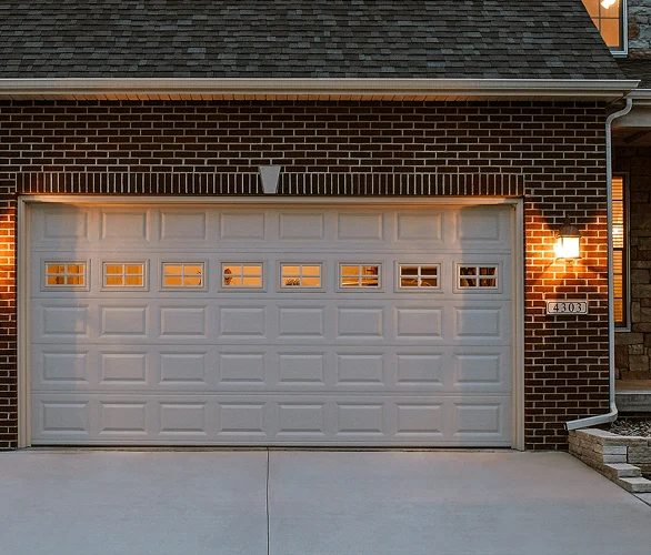 White raised-panel garage door