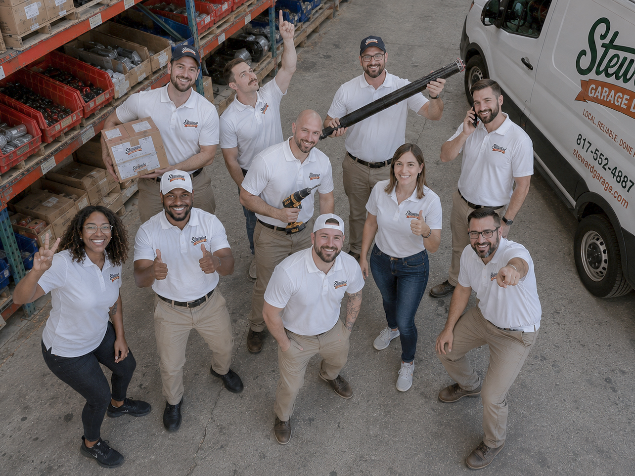 The Steward Garage Door Service team &mdash; DFW technicians and installers in branded polos beside a service van